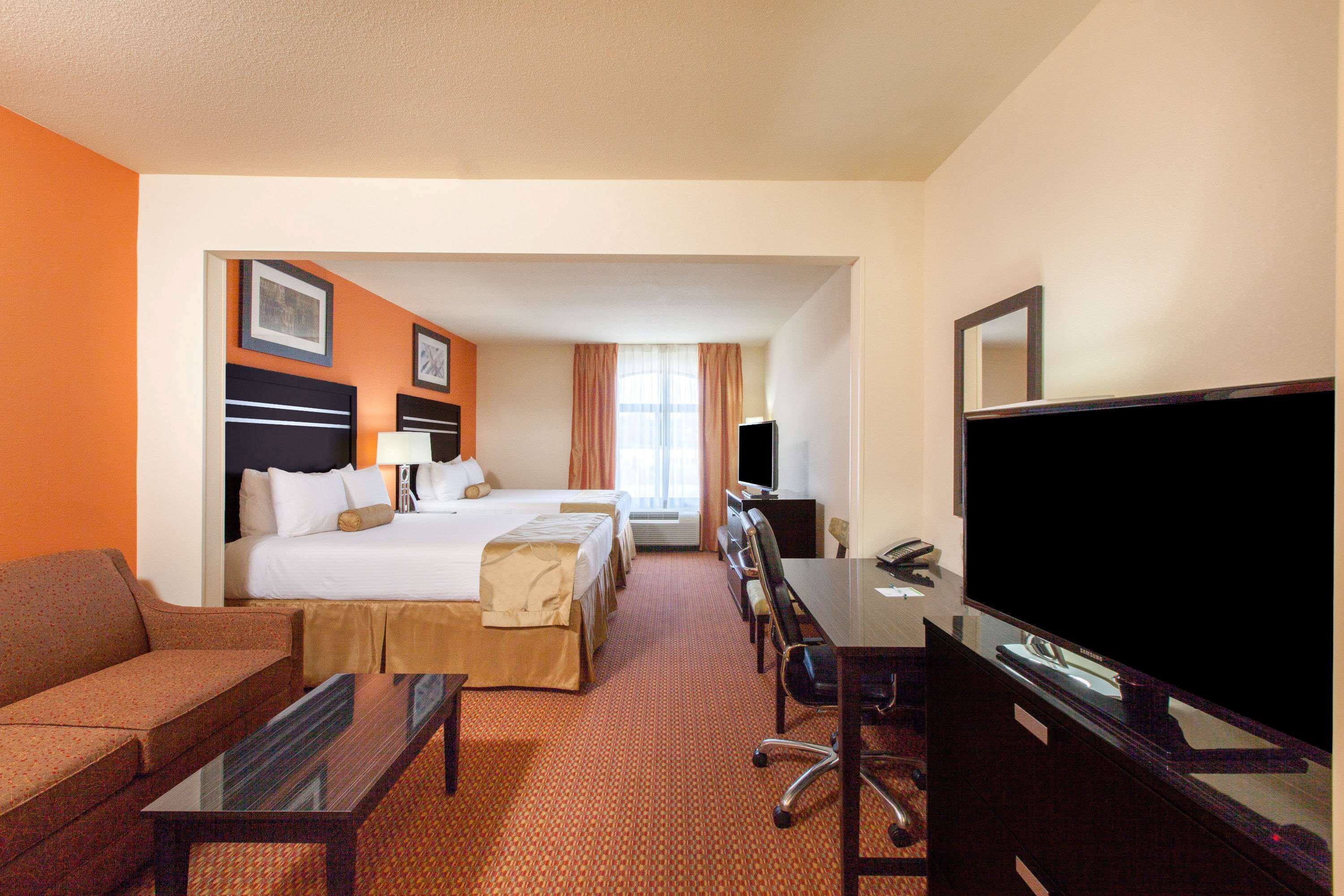 studio suite, 2 queen beds, non smoking | in-room safe, desk, iron/ironing board, free cots/infant beds