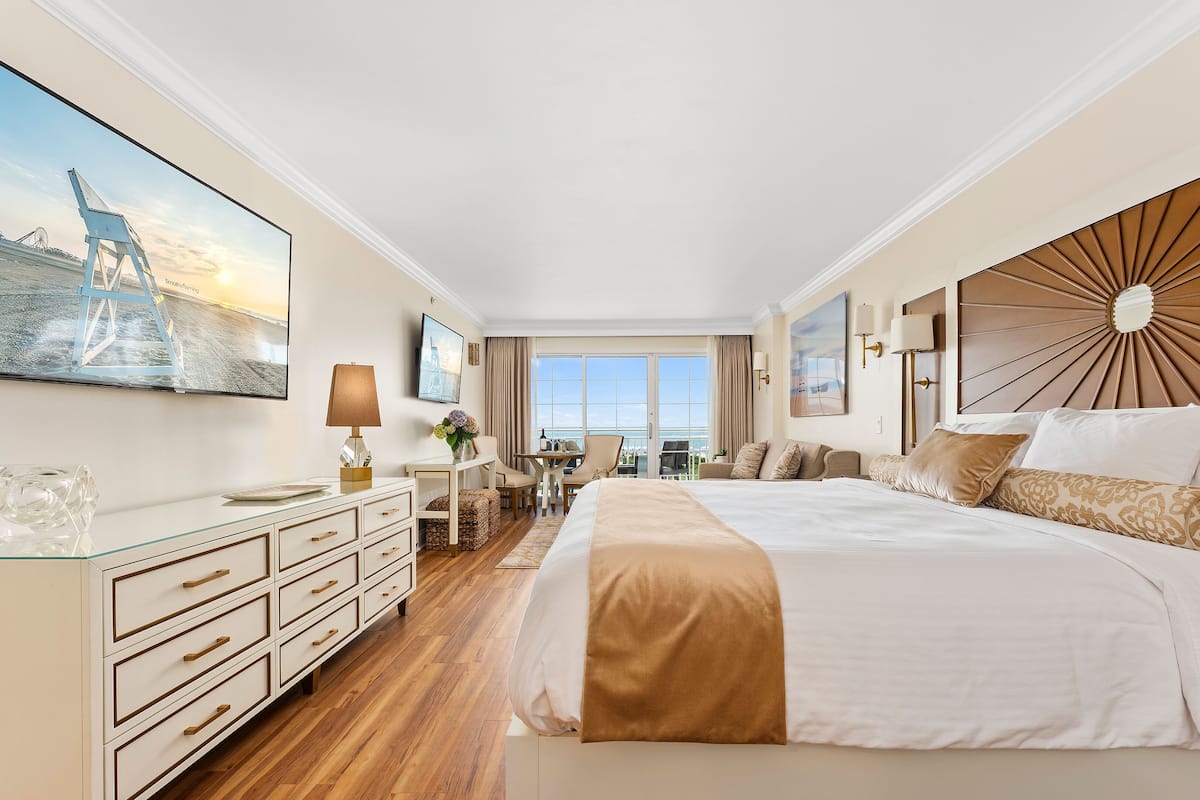 Deluxe Room, Ocean View | In-room safe, iron/ironing board, free WiFi, bed sheets