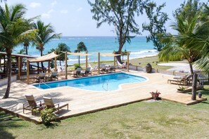 Outdoor pool, pool umbrellas, sun loungers