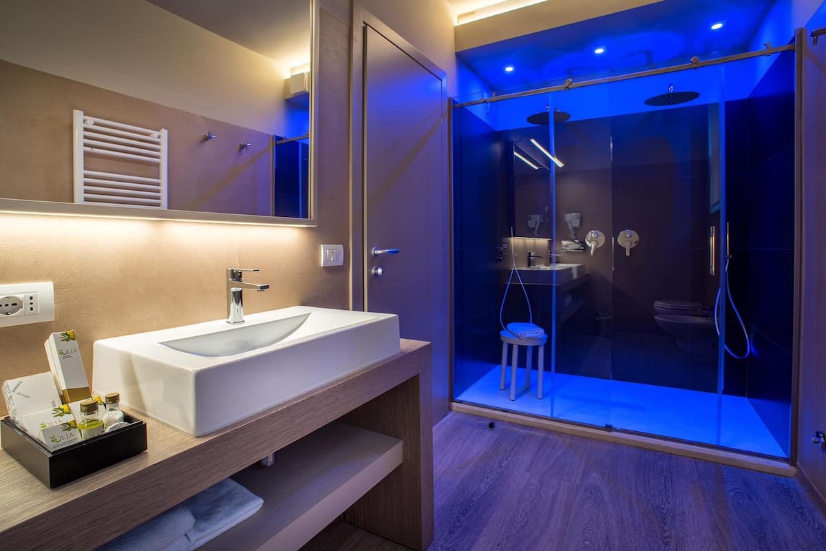 luxury suite | bathroom | shower, rainfall showerhead, free toiletries, hair dryer