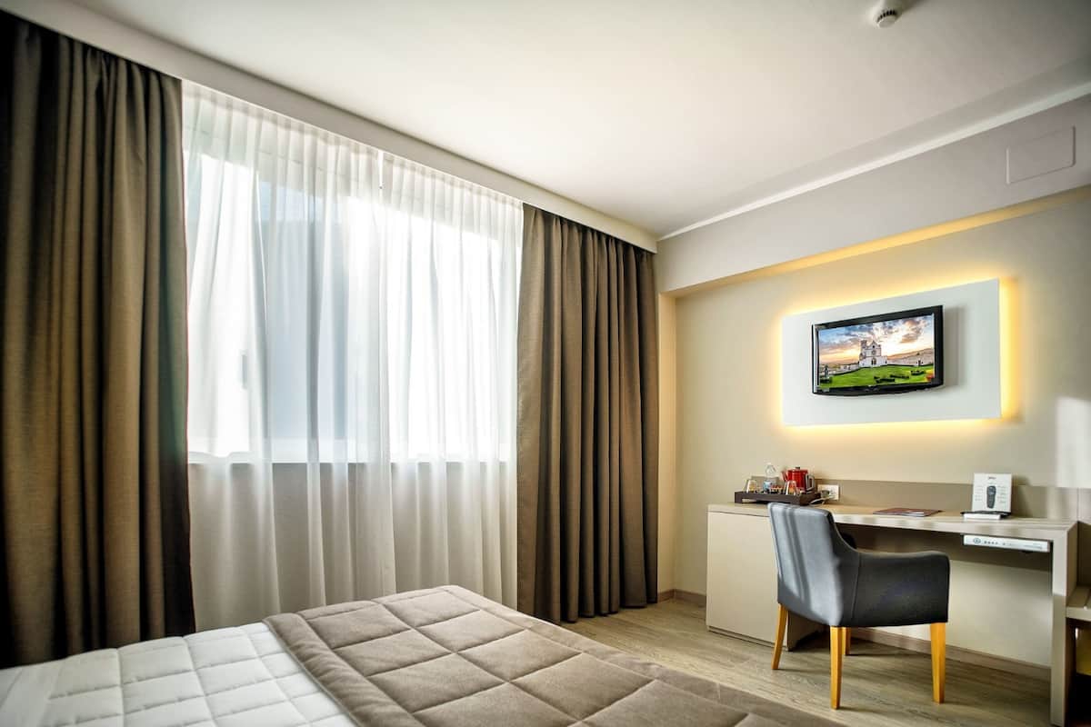 Literie de qualité supérieure, couette en duvet d'oie, minibar
