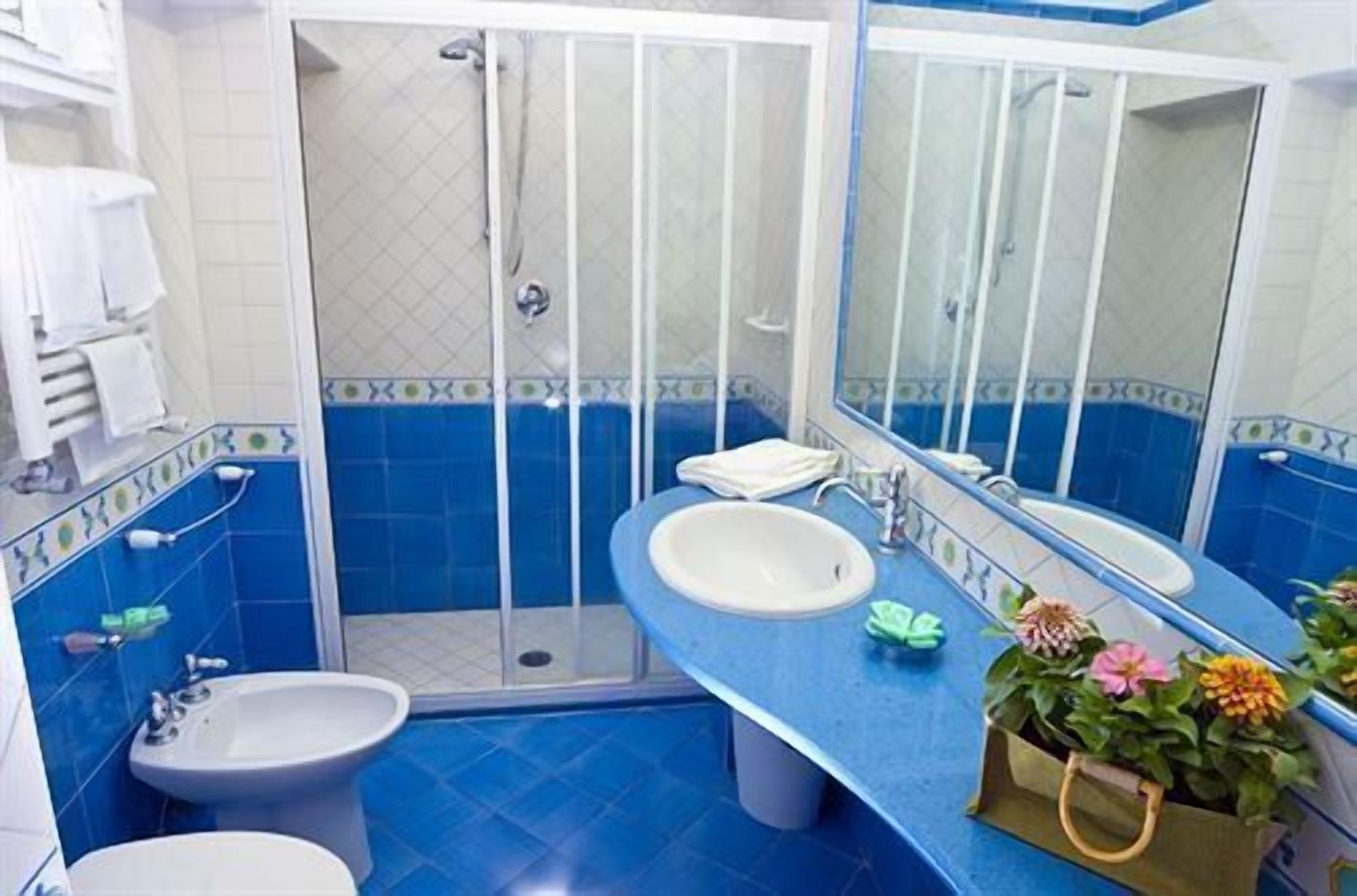 free toiletries, hair dryer, bidet, towels