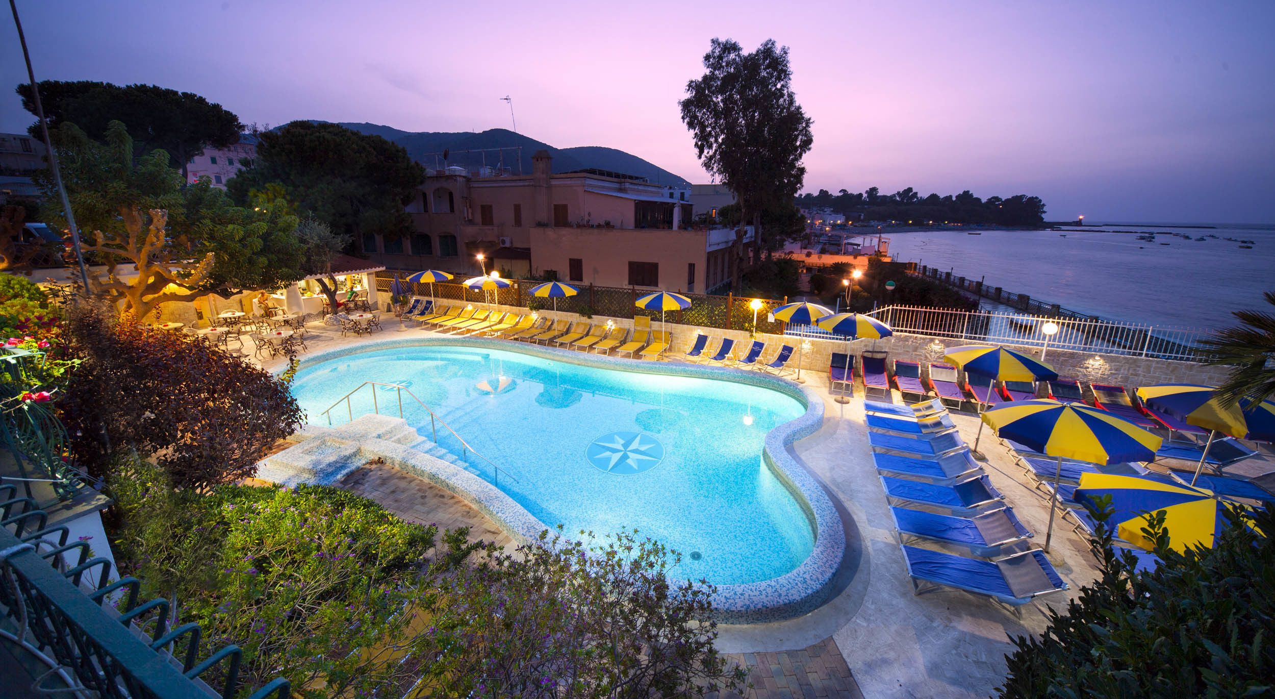 outdoor pool, pool umbrellas, pool loungers