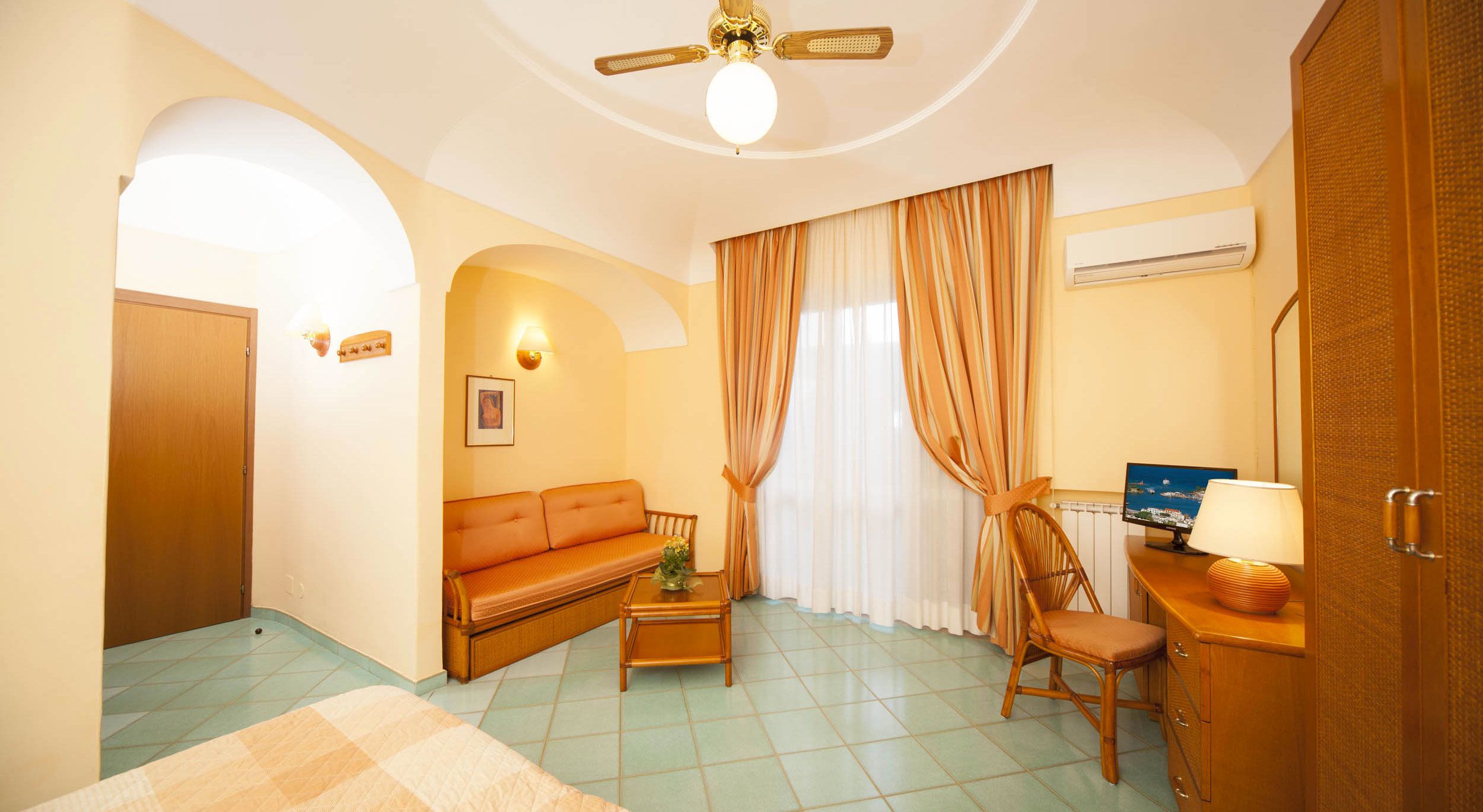 classic double room, balcony | living area | flat-screen tv