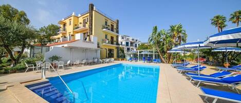 Indoor pool, outdoor pool, pool umbrellas, sun loungers