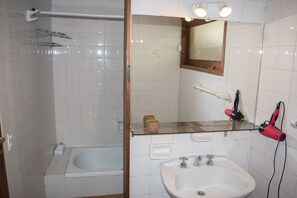 Combinació de dutxa i banyera i capçal de dutxa tipus cascada 