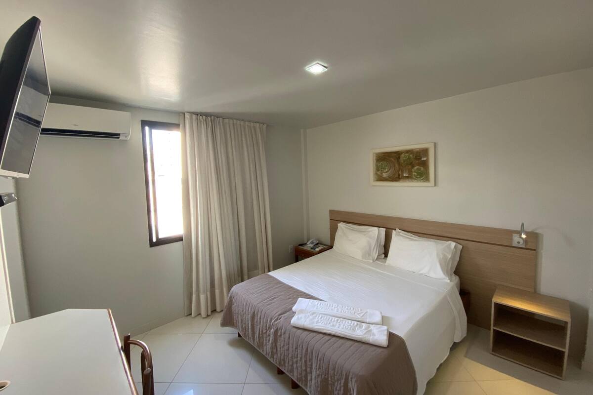 Minibar, desk, blackout drapes, travel crib