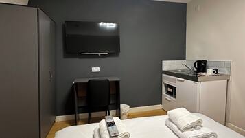 Egyptian cotton sheets, premium bedding, laptop workspace, soundproofing