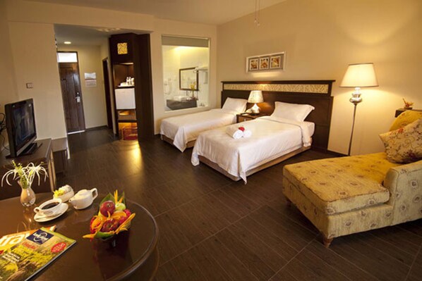 Deluxe Triple Room, Lagoon View | Minibar, in-room safe, desk, cribs (free) - Tok Aman Bali Beach Resort (Pasir Puteh)