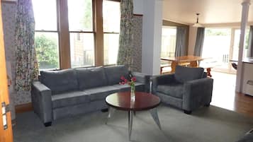 42-inch flat-screen TV with satellite channels, TV