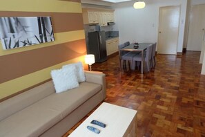 Suite, 1 Bedroom | Living room | 32-inch flat-screen TV with cable channels, TV - Asian Mansion Il (Makati)