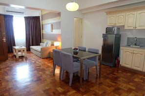 Suite, 1 Bedroom | Living area | 32-inch flat-screen TV with cable channels, TV - Asian Mansion Il (Makati)