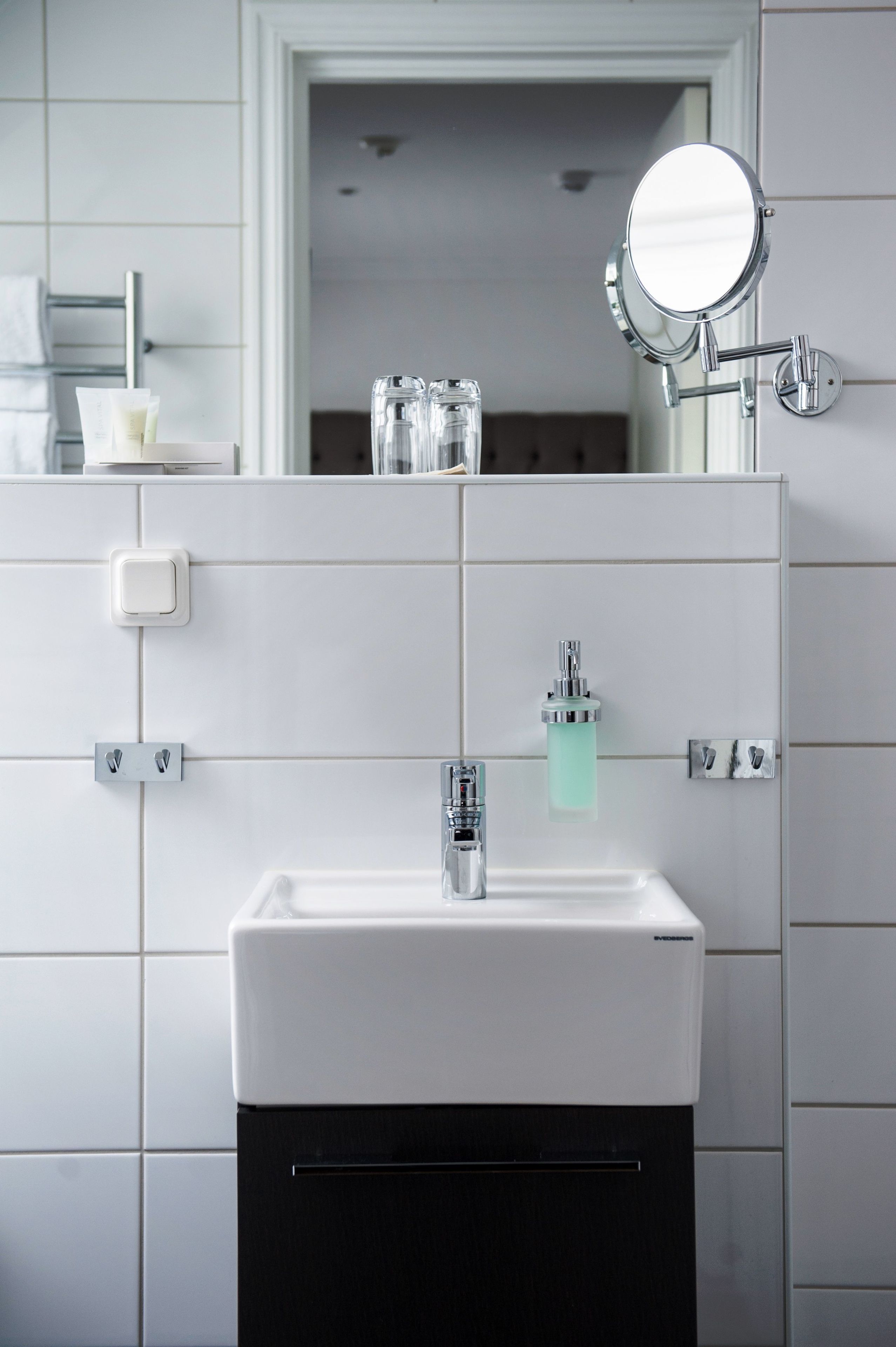 shower, designer toiletries, hair dryer, towels