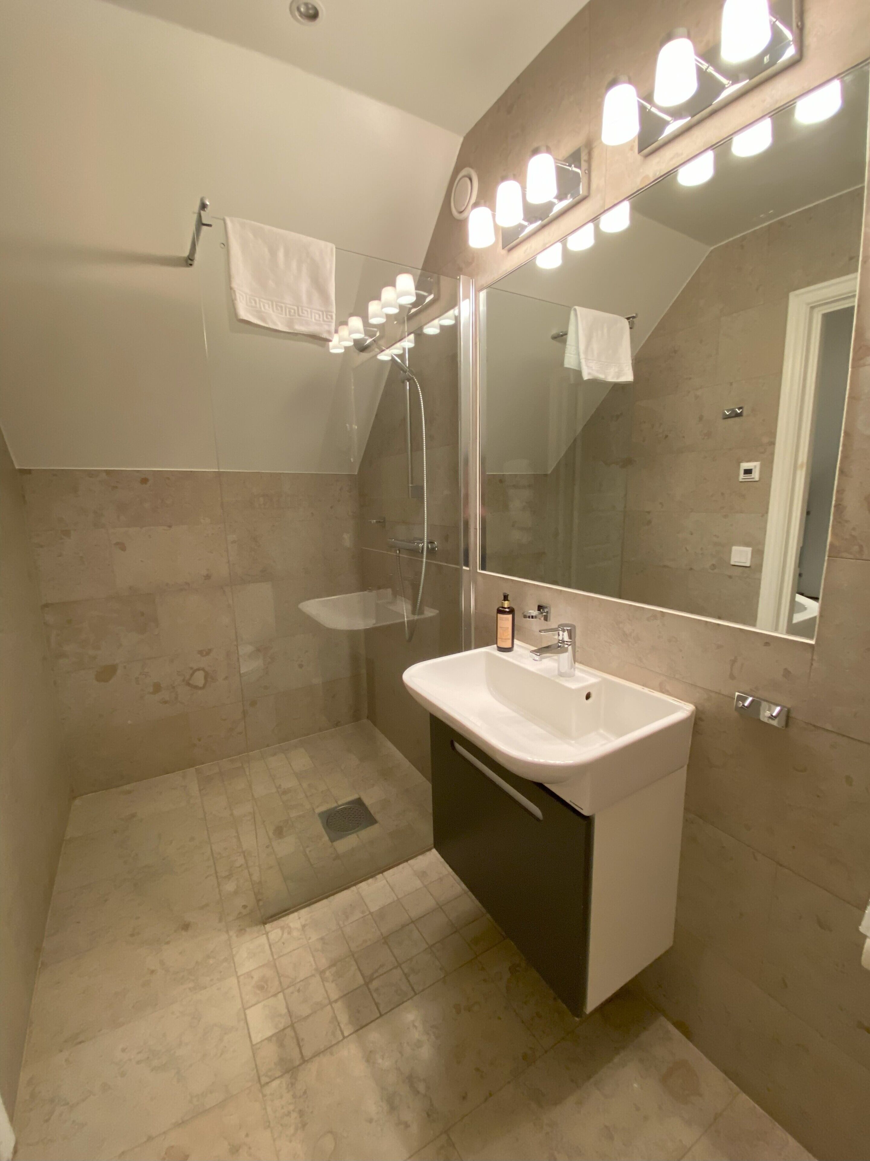 superior double room | bathroom | shower, designer toiletries, hair dryer, towels