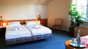 Down comforters, desk, blackout drapes, free WiFi