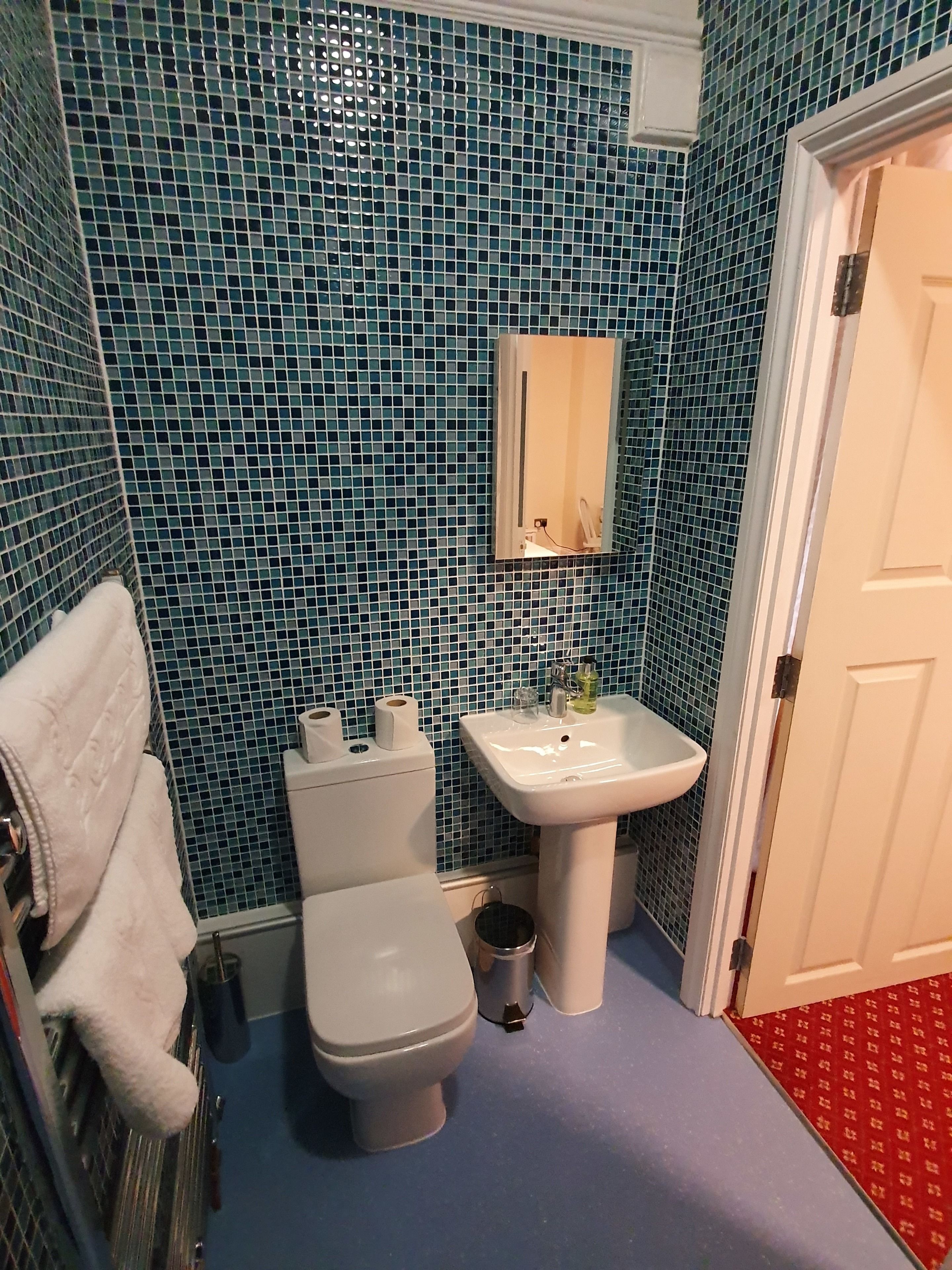 twin room | bathroom | shower, rainfall showerhead, free toiletries, hair dryer