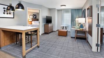 Premium bedding, pillow-top beds, desk, blackout curtains