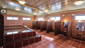 A public restroom with multiple sinks, a heated floor, and a large mirror. - Okinawa Sunplaza Hotel (Naha)
