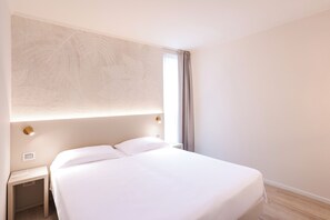 Minibar, desk, laptop workspace, blackout curtains