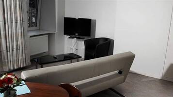 Junior suite | Woonkamer | Televisie