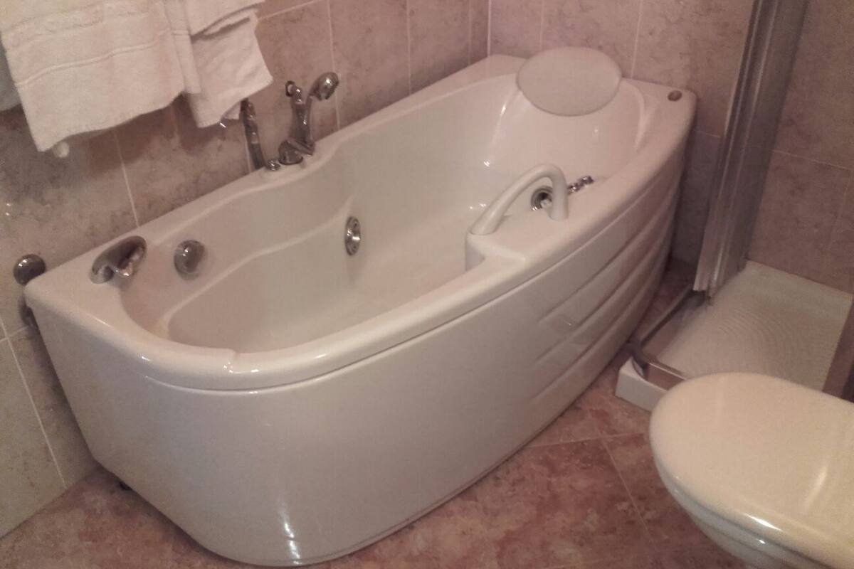 family room, private bathroom | free wifi, bed sheets