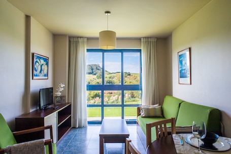 Una cassaforte in camera, tende oscuranti. Apartamentos Dunas de Liencres