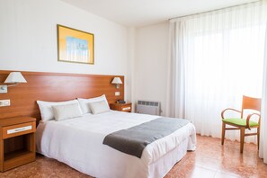 Pillow-top beds, laptop workspace, blackout curtains, cots/infant beds