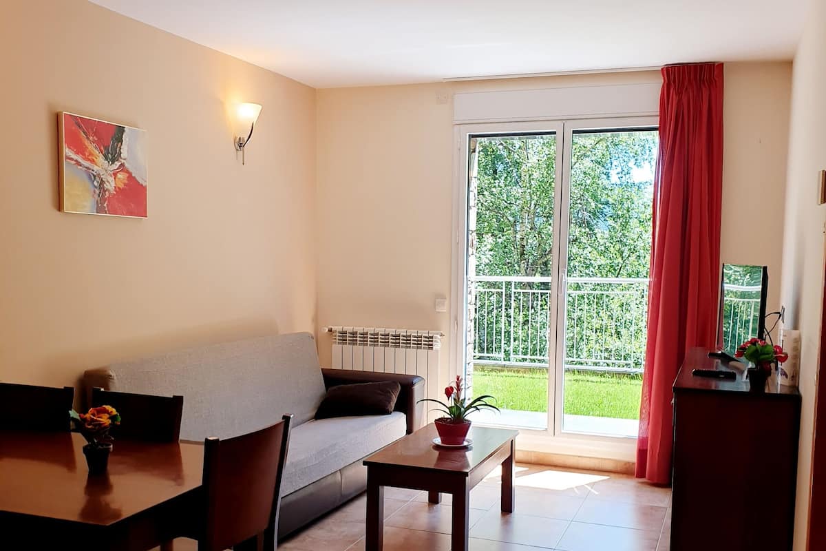 Comfort Apartment, Garden Area | Living area | 32-inch LED TV with digital channels, TV