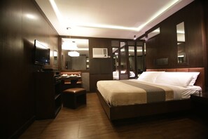 Deluxe Double or Twin Room | Individually decorated, individually furnished, free WiFi, bed sheets - Kape Hotel (Caloocan)