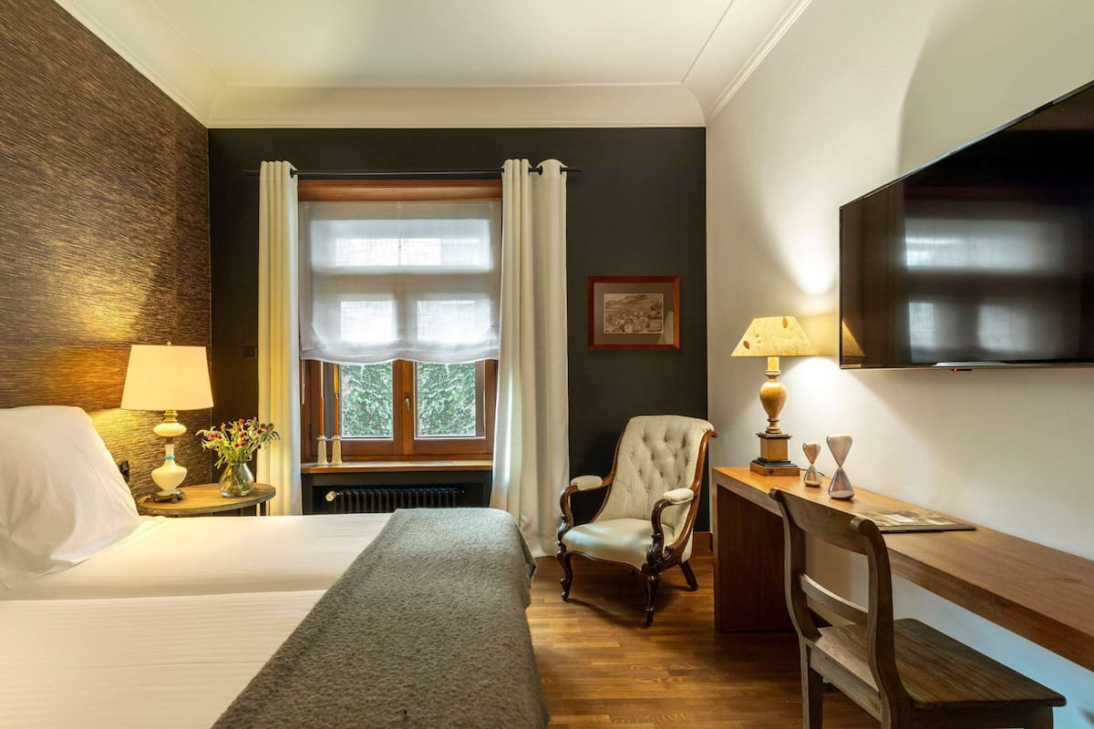 1 dormitorio, ropa de cama de alta calidad, edredones de plumas