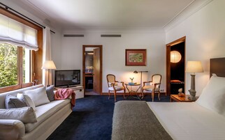 Premium bedding, down duvets, minibar, in-room safe