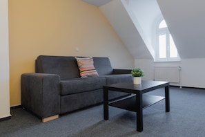Apartment, 1 Bedroom, Kitchenette | Living area - Penzion Dvorákova (Brno)