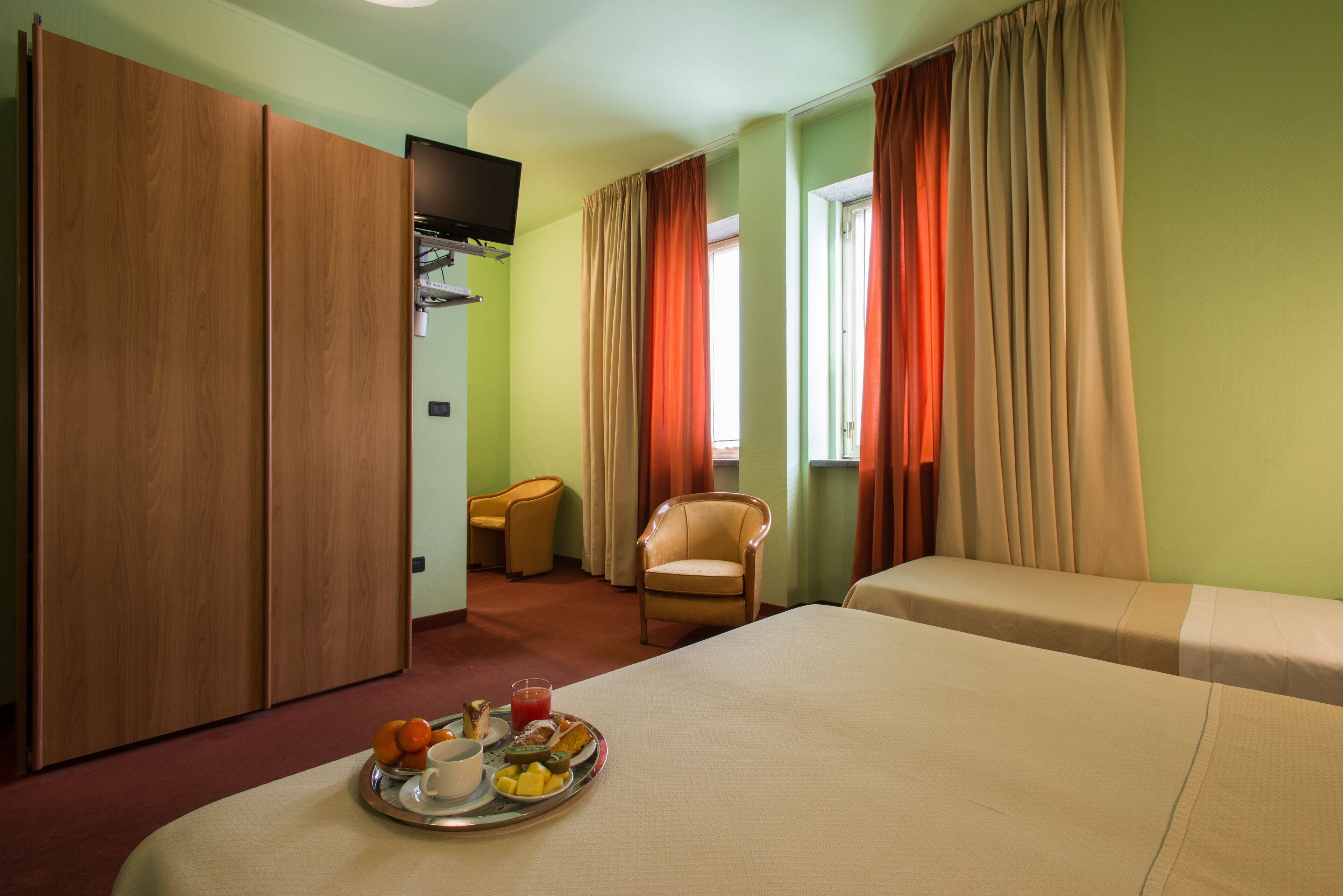 standard triple room | minibar, in-room safe, desk, blackout curtains
