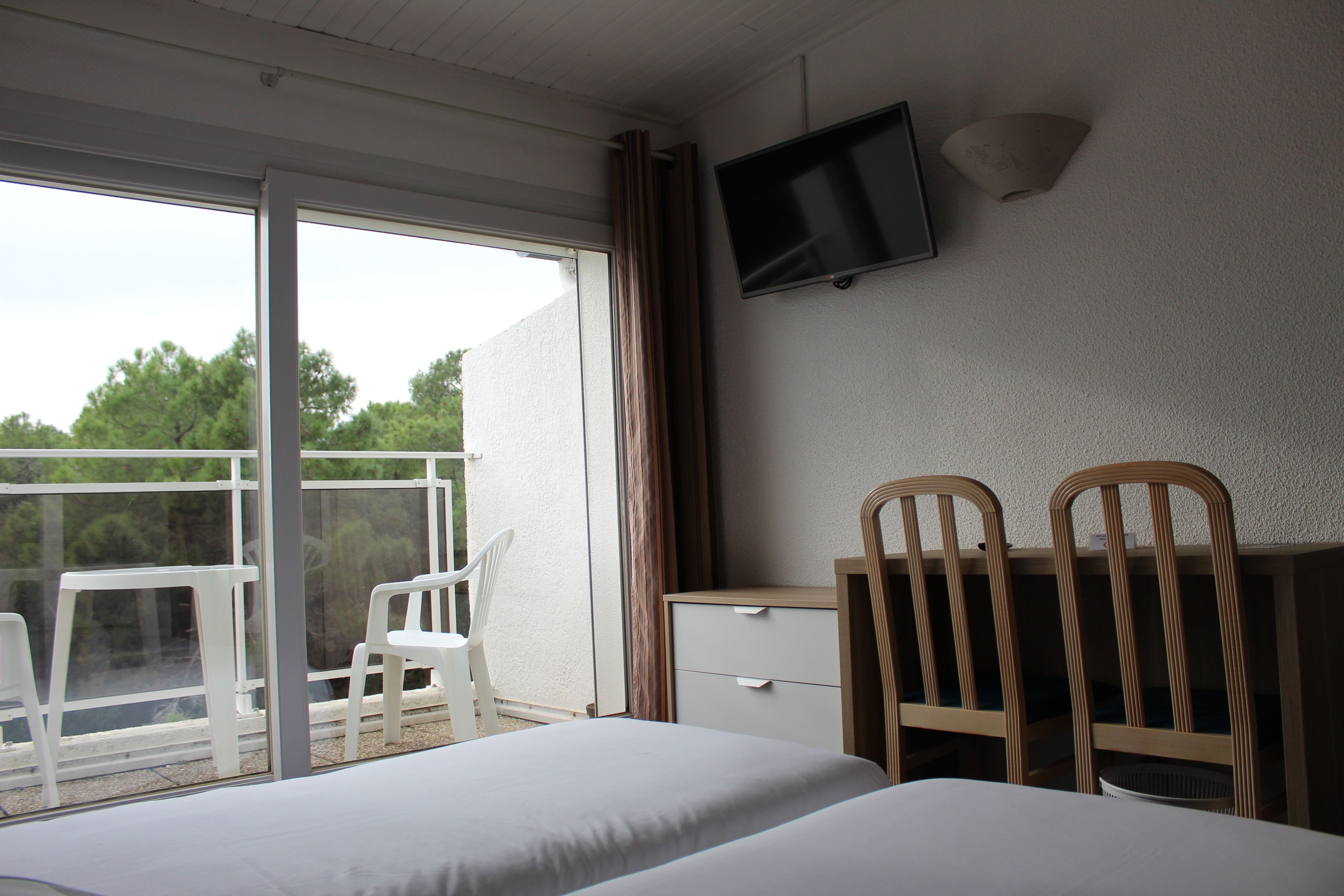 individually decorated, individually furnished, desk, blackout curtains