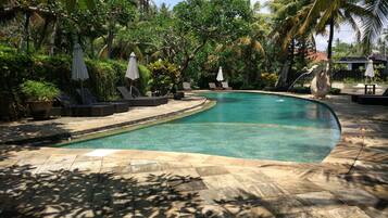 Outdoor pool, open 8:00 AM to 7:00 PM, pool umbrellas, pool loungers