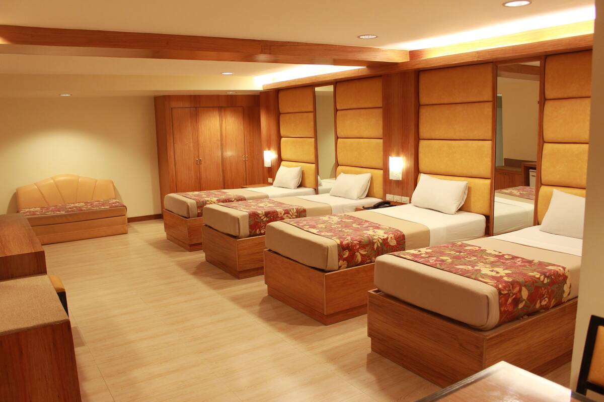Standard Quadruple Room, 1 Bedroom | In-room safe, rollaway beds, free WiFi