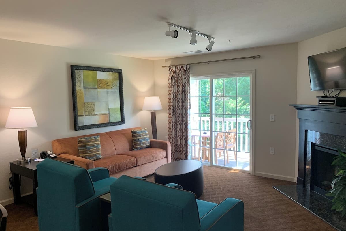 Deluxe Apartment, 2 Bedrooms, Kitchen | Living room | 40-inch flat-screen TV with cable channels, TV, fireplace