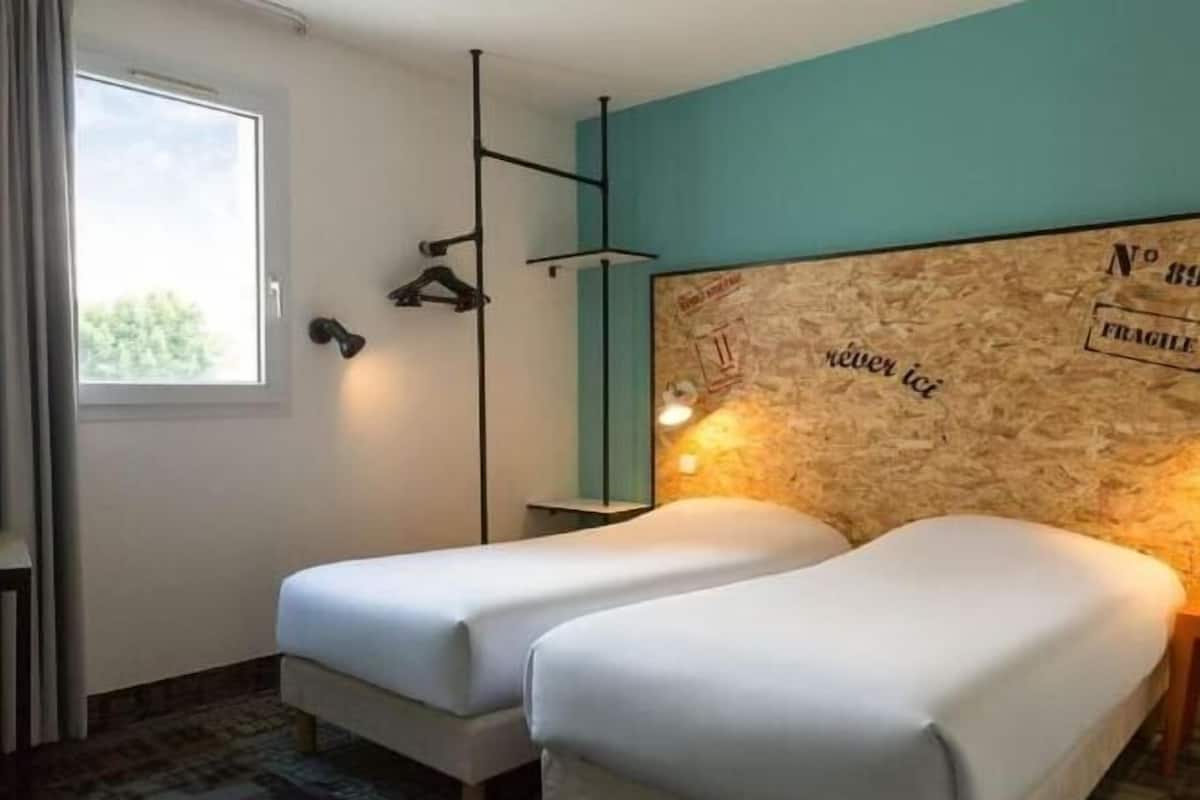 Chambres insonorisées, fer et planche à repasser, Wi-Fi gratuit