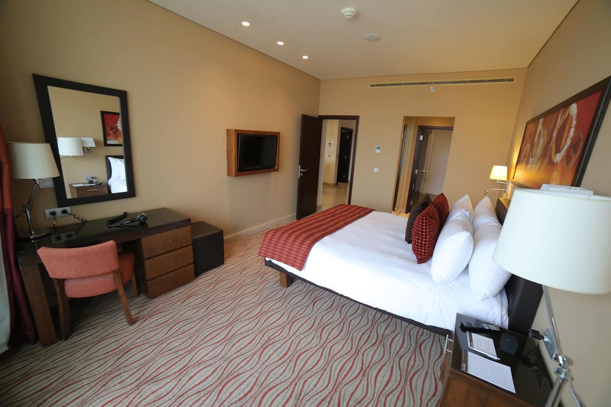 Lakens van Egyptisch katoen, luxe beddengoed, een kluis op de kamer