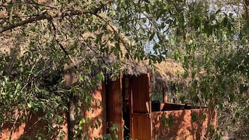 African Cabin | Premium bedding, in-room safe, individually decorated