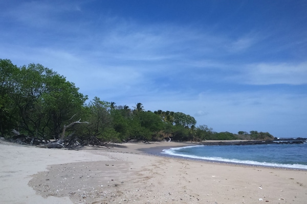 Beach nearby, sun loungers