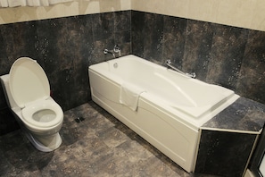 Suite, 1 Bedroom | Bathroom | Separate tub and shower, spring water tub, free toiletries, hair dryer