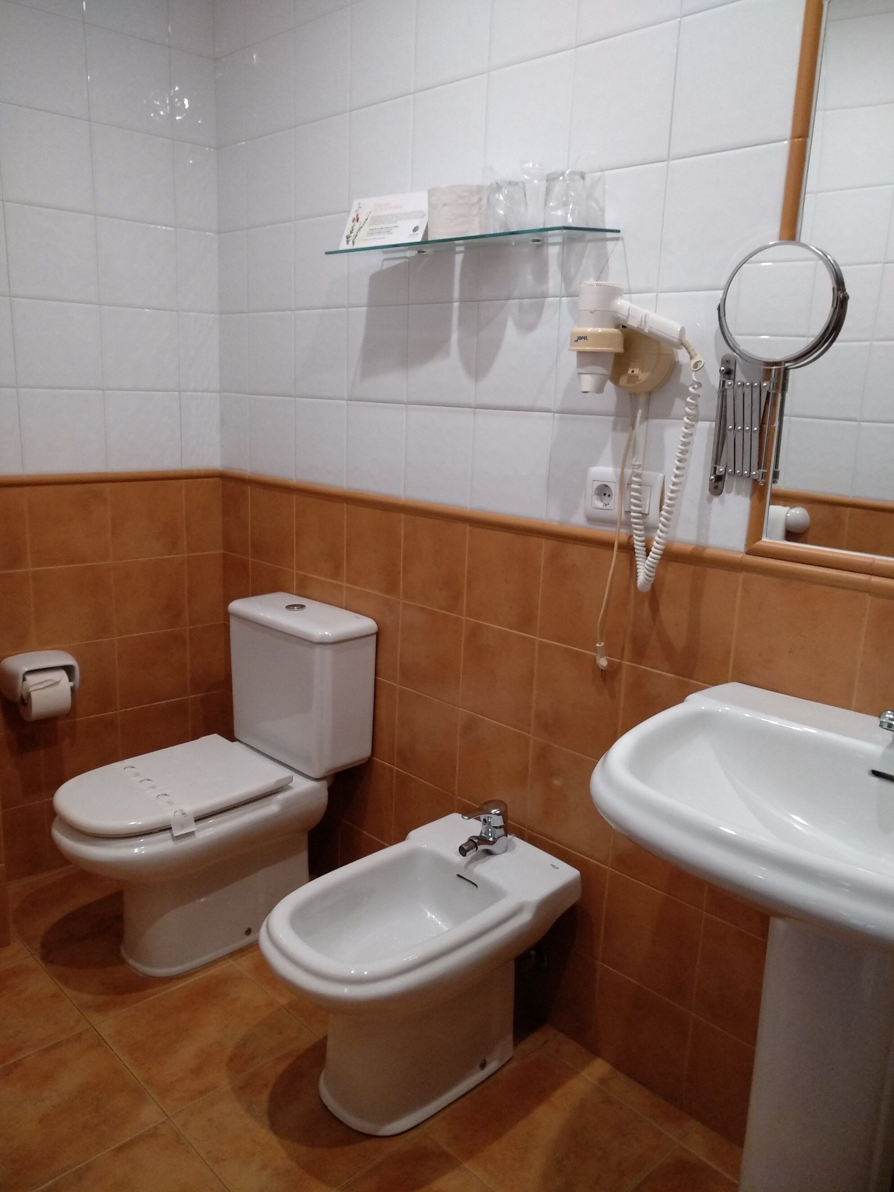 bathtub, free toiletries, hair dryer, towels