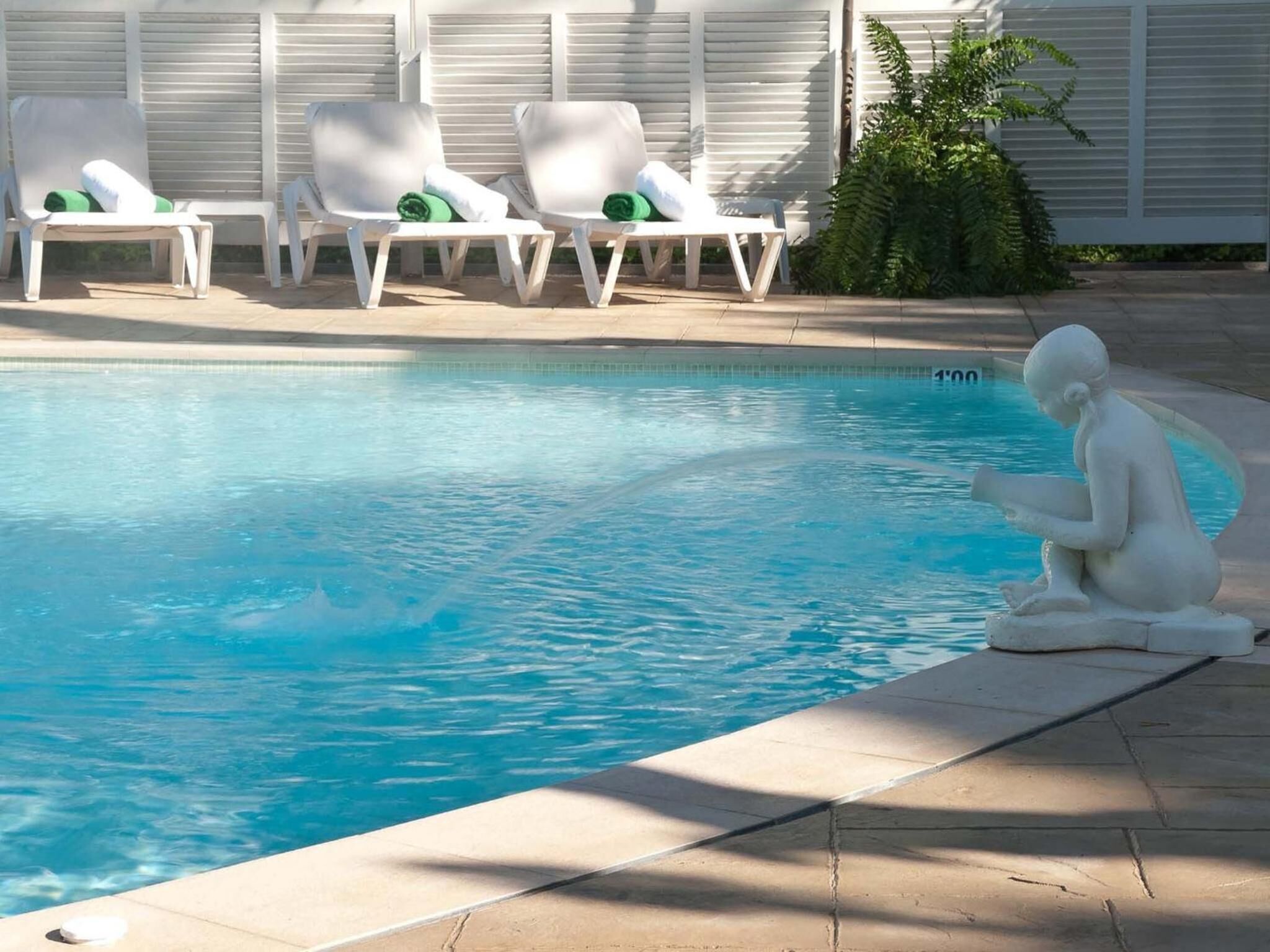 outdoor pool, pool loungers