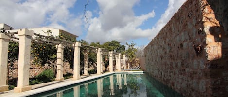 Outdoor pool, pool umbrellas, sun loungers