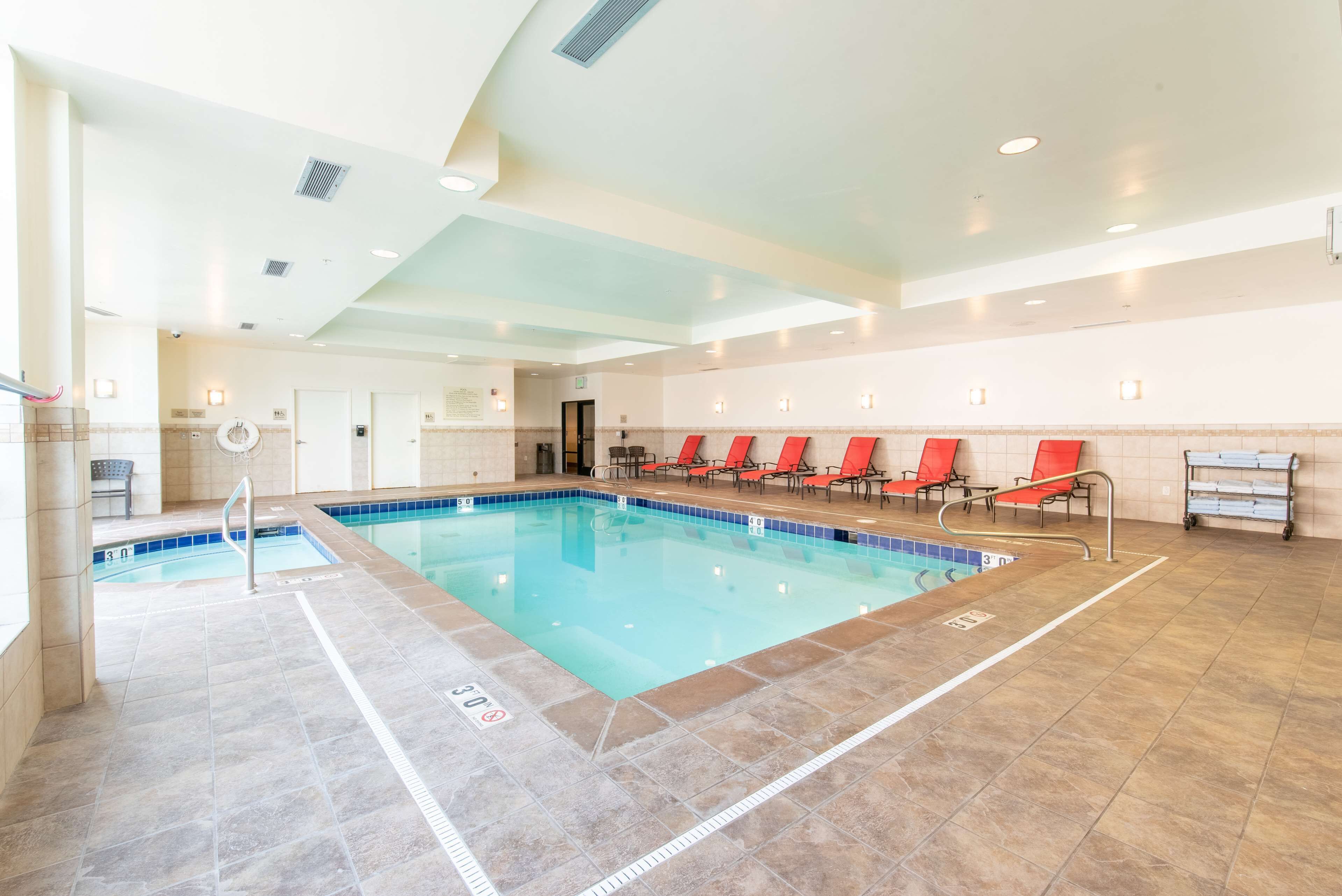 indoor pool, open 8:00 am to 10:00 pm, pool loungers