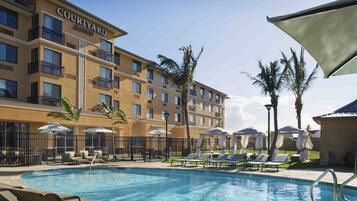 Outdoor pool, pool umbrellas, pool loungers