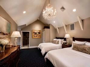 A hotel room with two beds, a chandelier, a painting, and a wooden dresser. - The Federal Pointe Inn Gettysburg, an Ascend Collection Hotel (Gettysburg)