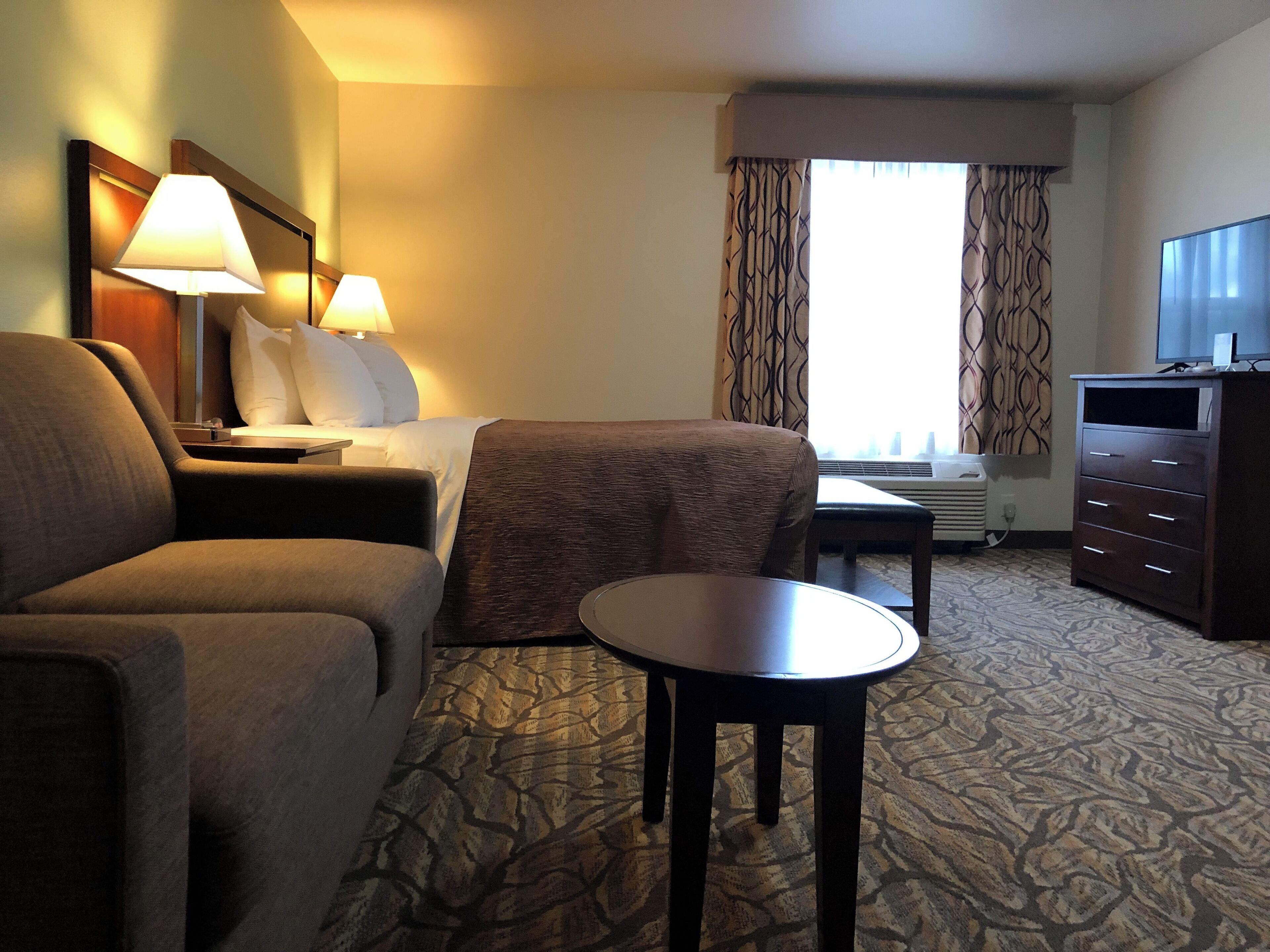 extended stay suite, 1 queen bed | premium bedding, desk, laptop workspace, blackout curtains
