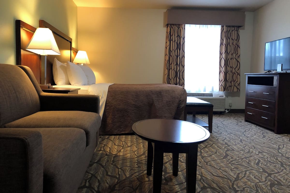 extended stay suite, 1 queen bed | premium bedding, desk, laptop workspace, blackout curtains